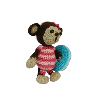 Peluche mono flotador hecho a mano a ganchillo (amigurumi). - Imagen 2