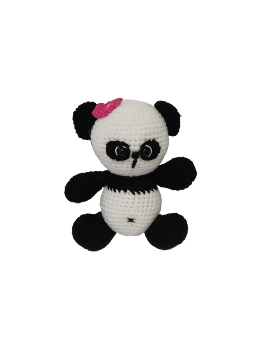 Peluche oso panda con flor fucsia hecho a mano a ganchillo (amigurumi). - Imagen 1