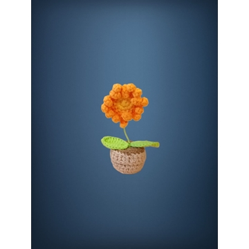 Planta amarilla naranja hecha a mano a ganchillo (amigurumi). - Imagen 1