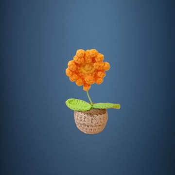 Planta amarilla naranja hecha a mano a ganchillo (amigurumi). - Imagen 1