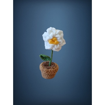 Planta blanca y amarillo hecha a mano a ganchillo (amigurumi). - Imagen 1